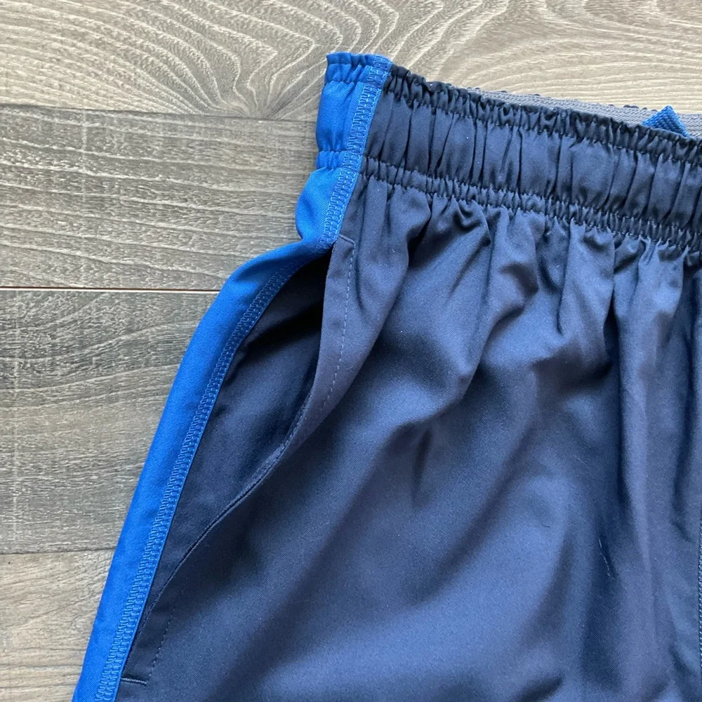 NWT Nike Team Woven Dri Fit Training Pants Men’s MEDIUM Blue Cord Hem 377786-451